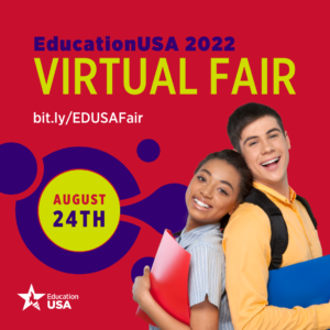 Two students stand back-to-back smiling, holding folders